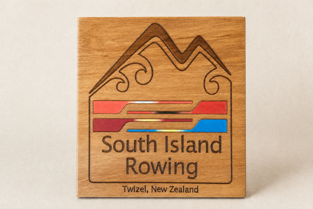 South Island Rowing colour-inlay trial in engraved timber, created for a lectern in Twizel